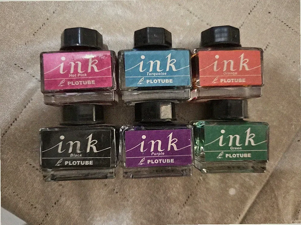 INK Various bottles of used ink Black Green Orange Pink Purple Turquoise READ